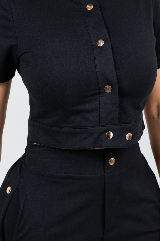 Sleek Crop Top Paired With High-Waist Black Pants With Gold Buttons