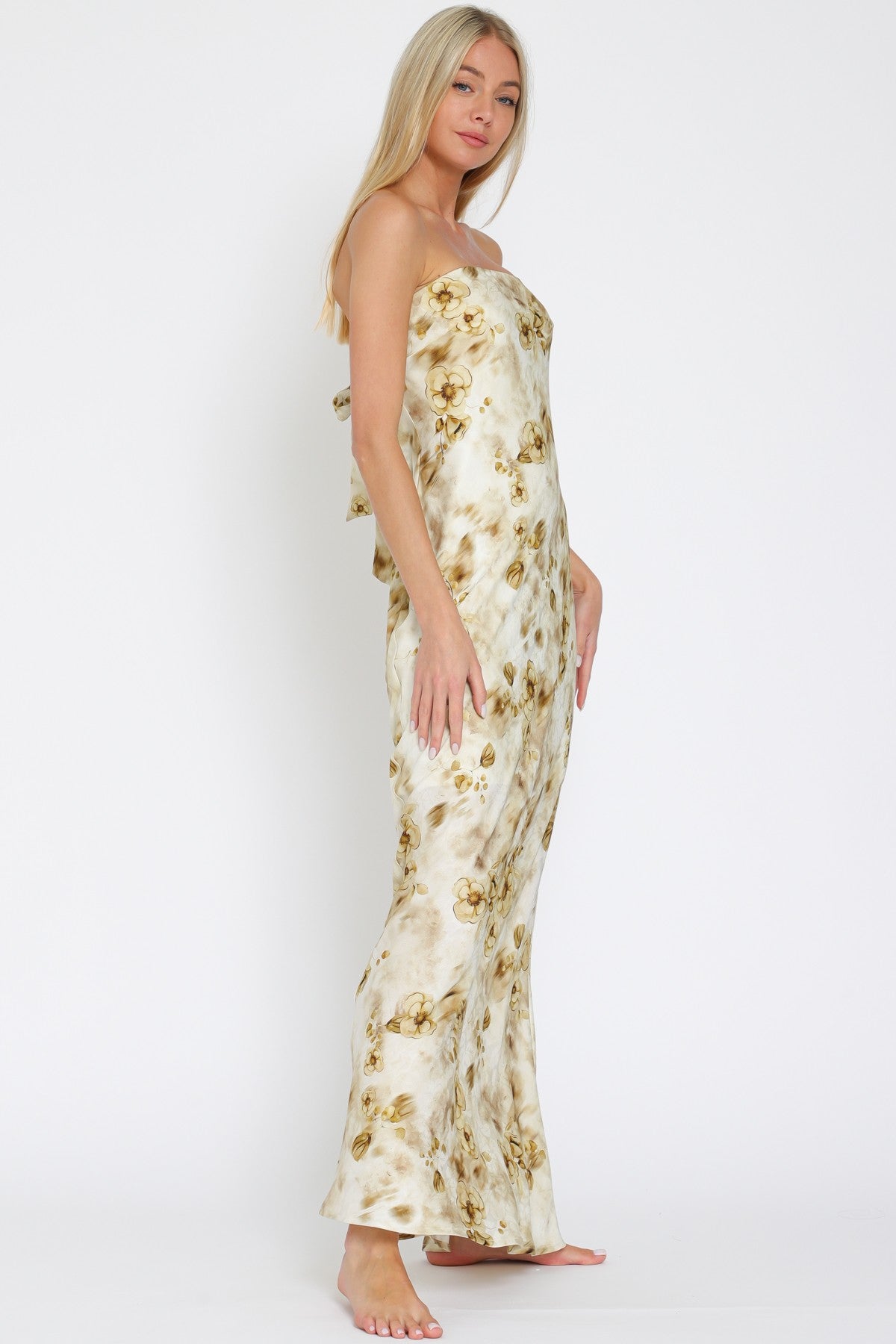 Elegant Gold Maxi Dress Features a Striking Tube Silhouette