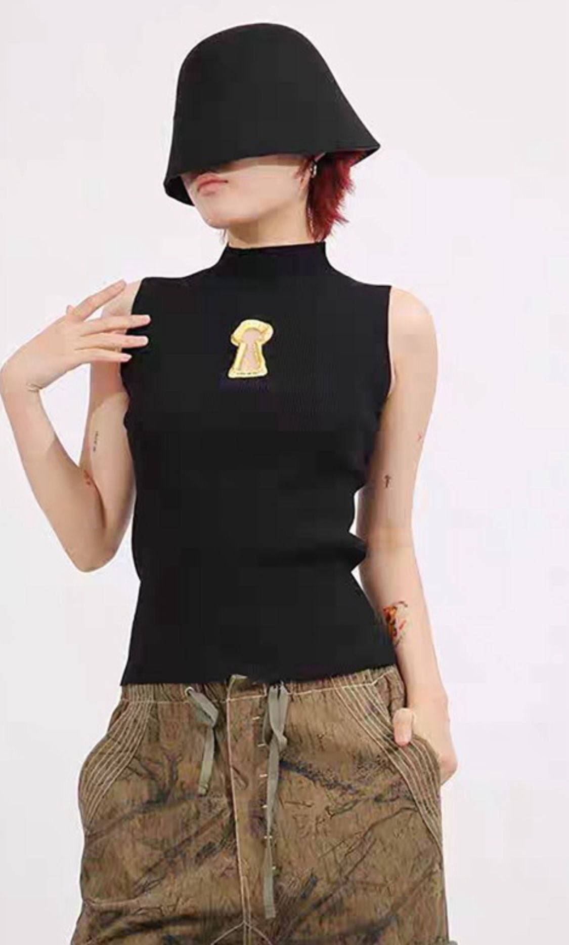 Black Fitted Top with Gold Detail â€“ Modern Elegant Style