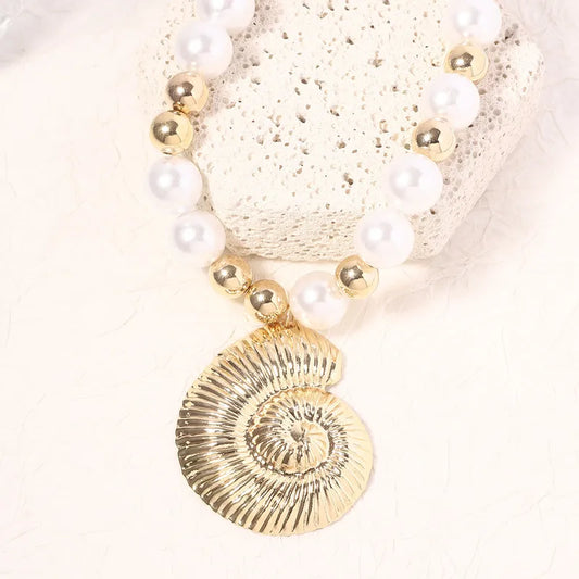 Gold Conch Necklace