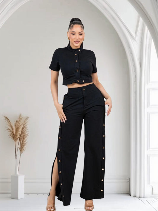 Sleek Crop Top Paired With High-Waist Black Pants With Gold Buttons
