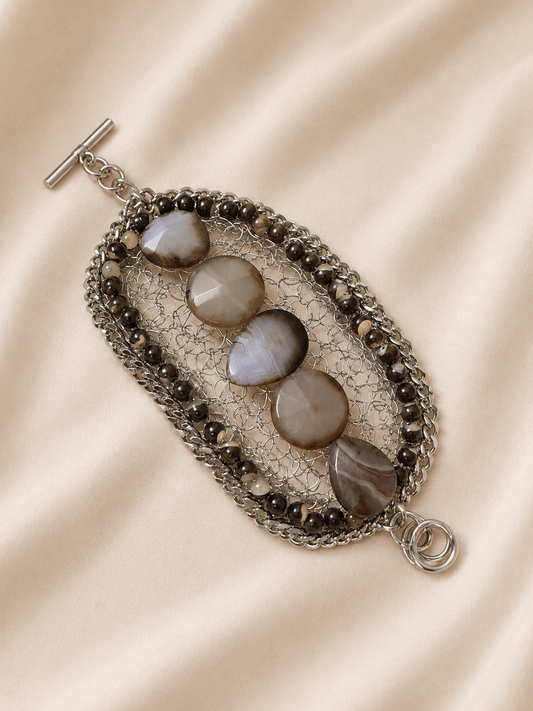 Woven bracelet with gray stones
