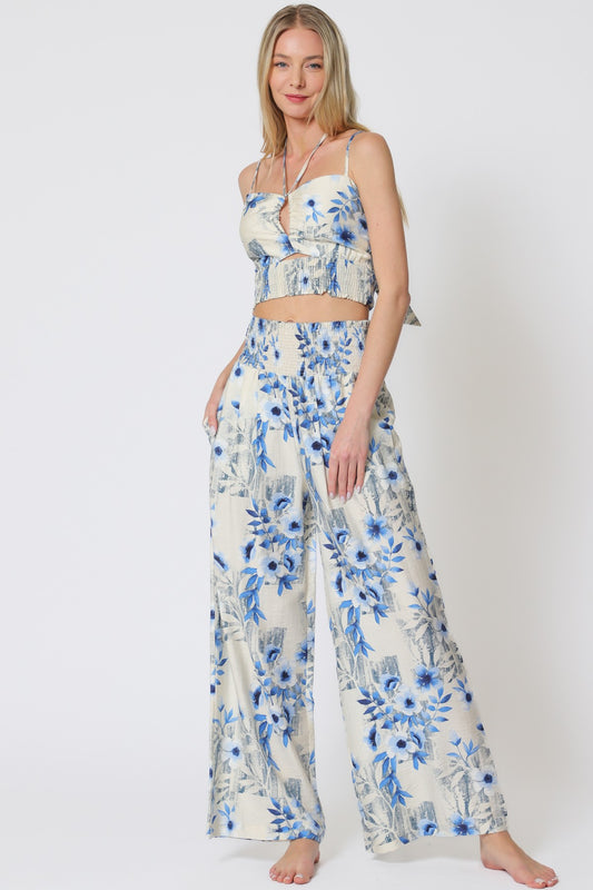 Strap Top Paired With Long Pants In A Refined Ivory And Blue