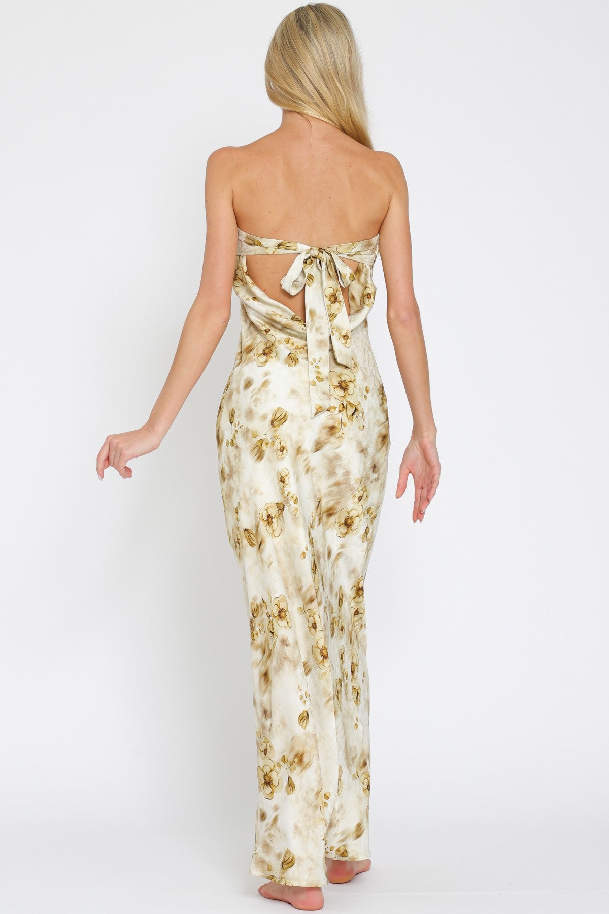 Elegant Gold Maxi Dress Features a Striking Tube Silhouette